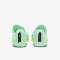 A pair of green shoes with black and white lettering.