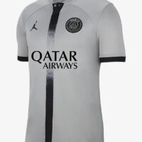 A white and black soccer jersey with qatar airways on it.